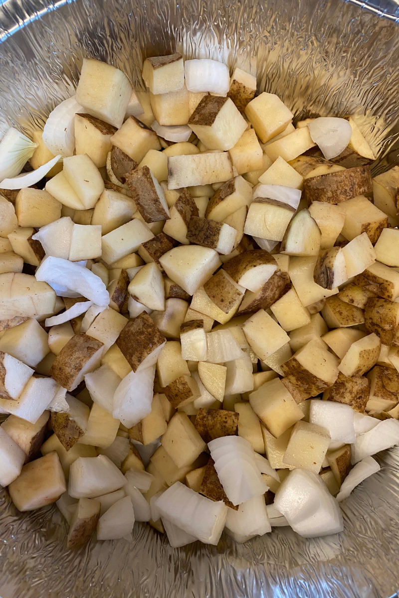 Easy Creamy & Cheesy Dutch Oven Potatoes with Bacon Reckoning